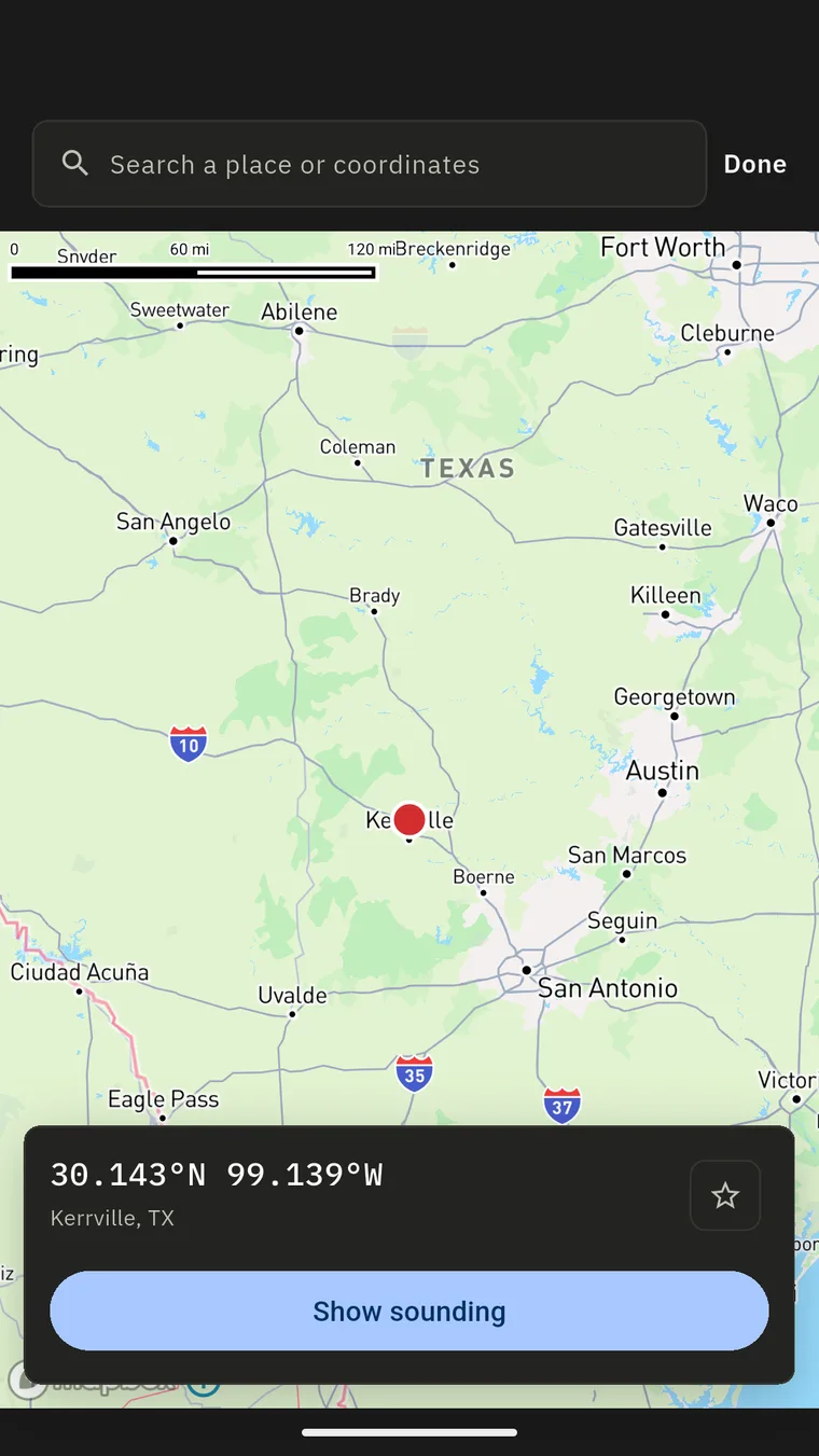 The location map with a marker dropped on Kerrville, Texas and a sheet naming the place, the way a sounding is chosen by tapping the map.